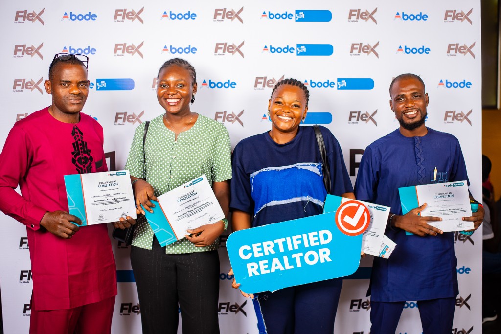 Abode Academy graduates with certificates at certification ceremony